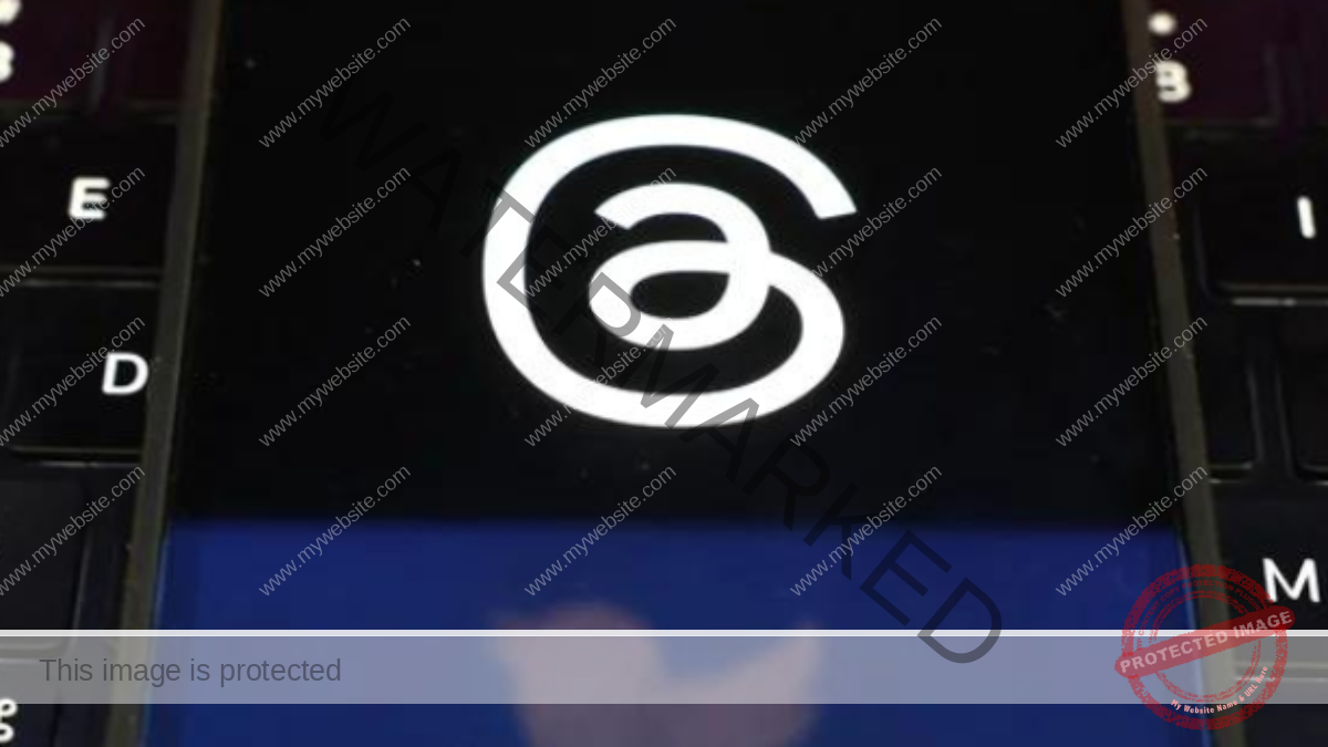 In this photo illustration, the Twitter and Threads logos are displayed on a cell phone on July 05, 2023, in San Anselmo, California. — AFP